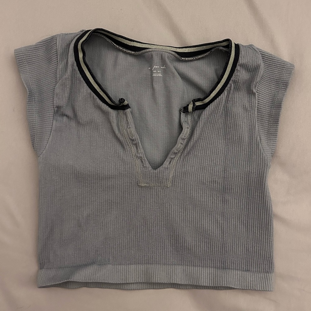 light grey-blue urban go for gold top
size M/L
